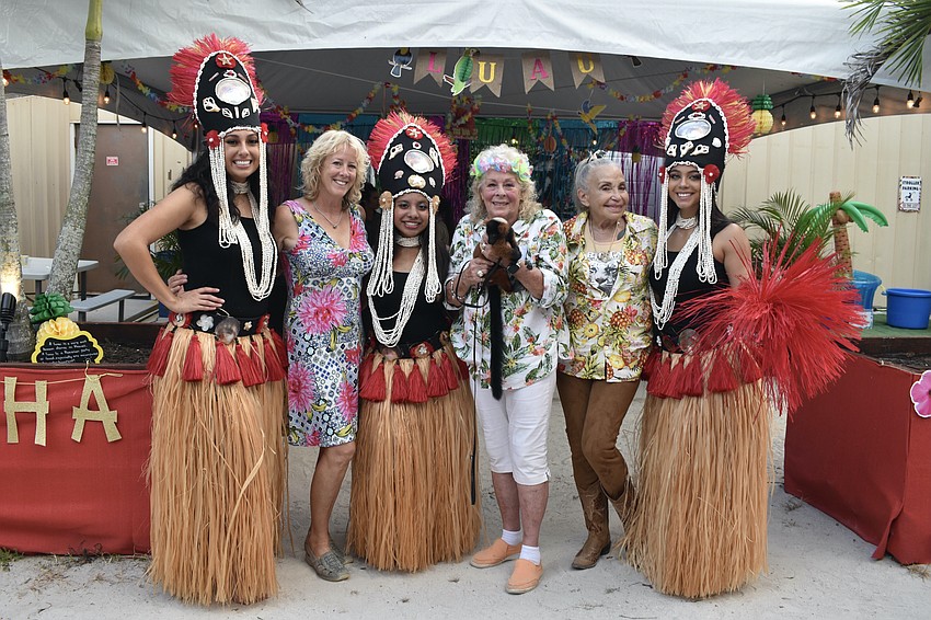 Big Cat Habitat joins with Polynesian dancers from Echo of the South Pacific in a group that includes Etasa Evans, Nancy Nallin, Kaya Paongo, Kay Rosaire, An Cantor, and Aliyah Wiley