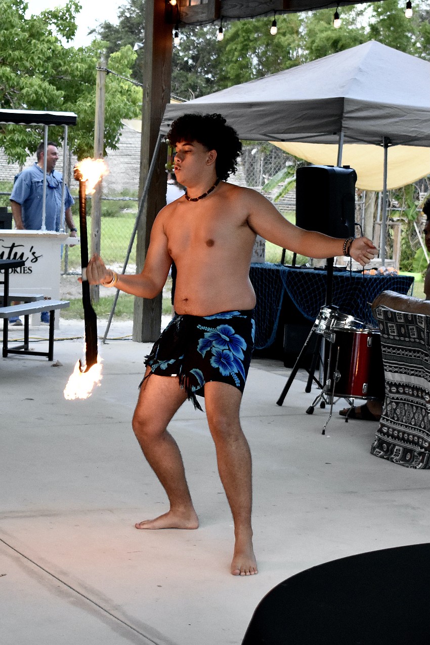 Taei Evans tops off the experience with a fire dance.