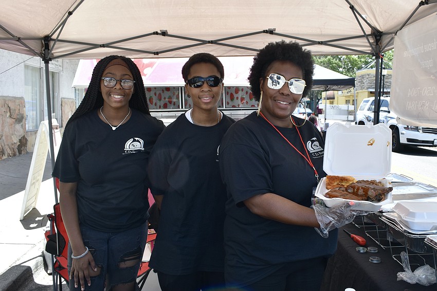 14-year-old Maliyaa Summers, 17-year-old Azariah Summers, and Jessica Smith of CJ's Barbeque