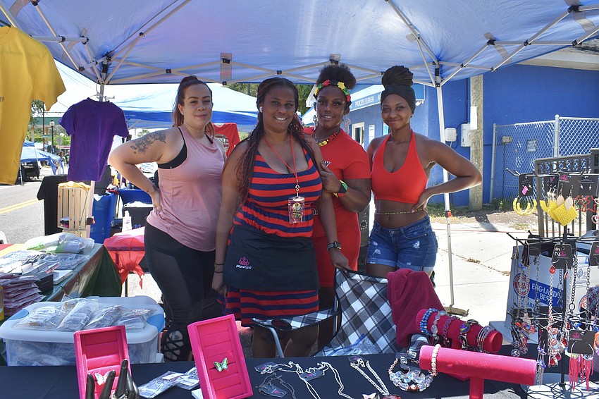 Anna Hodge, Shinece Davis, Nakeisha Davis, and Shakella Frett of the Island Vibes stand
