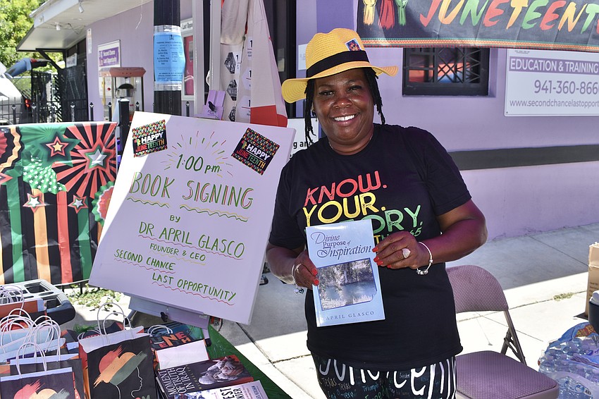 April Glasco, CEO and founder of Second Chance Last Opportunity, offere signings of her self-help book Divine Purpose of Inspiration. She said the book 