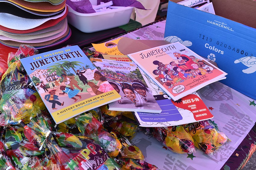 Books about Juneteenth are offered at the Second Chance Last Opportunity stand.