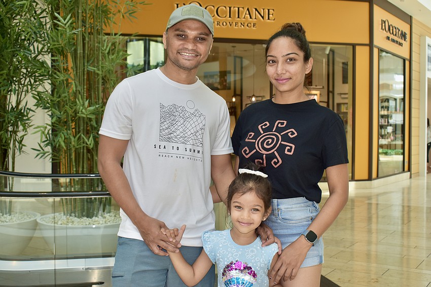 Meadows residents Pankaj, Ira and Rachana Chaudhari shop and celebrate dad.