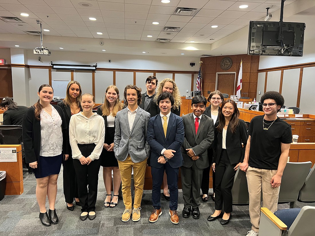 Members of the Riverview High School Mock Trial Club simulate a murder trial at the Sarasota Bar Association's 12th Judicial Circuit High School Mock Trial Competition.
