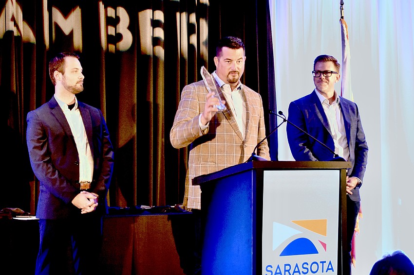 First Watch public relations manager Hunter Carpenter, chief executive officer Chris Tomasso, and chief operating officer Dan Jones take to the stage.