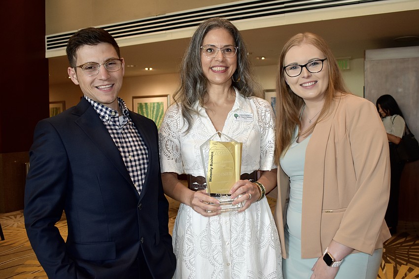 Herrera Psychology lead clinician Ethan Weiss, ownr Dr. Stacie Herrera, and business manager Ashlyn Kennedy won the Minority Business Award.