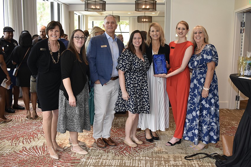 FCCI Insurance Group staff Lisa Adamaitis, Leah Dechant, Michal Brown, Patricia Gould, Nancy Paradise, Mania-Francesca Massaro, and Phyllis Barnsley.