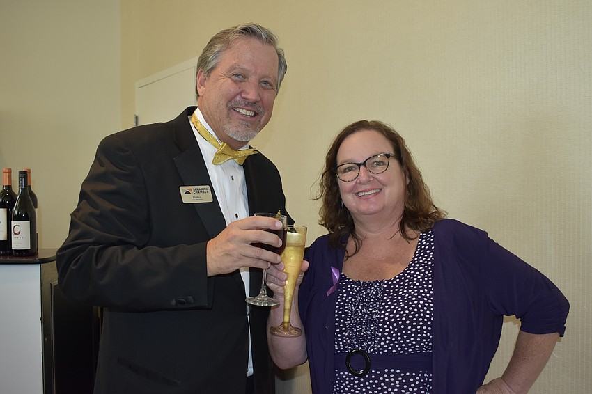 Sarasota Chamber vice president Ed Hill and Town Square center director Jill Grinnell.