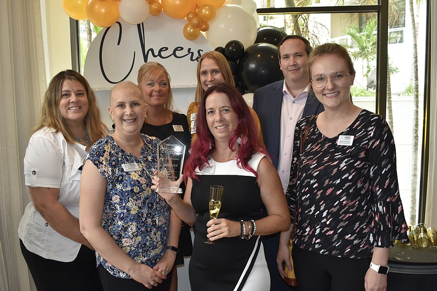 Humane Society of Sarasota County staff members Jaime Limoges, Erin Jordan, Jenny Hamner, Jennifer Poppen, Anna Gonce, David Lynch, Emory Groeneveld