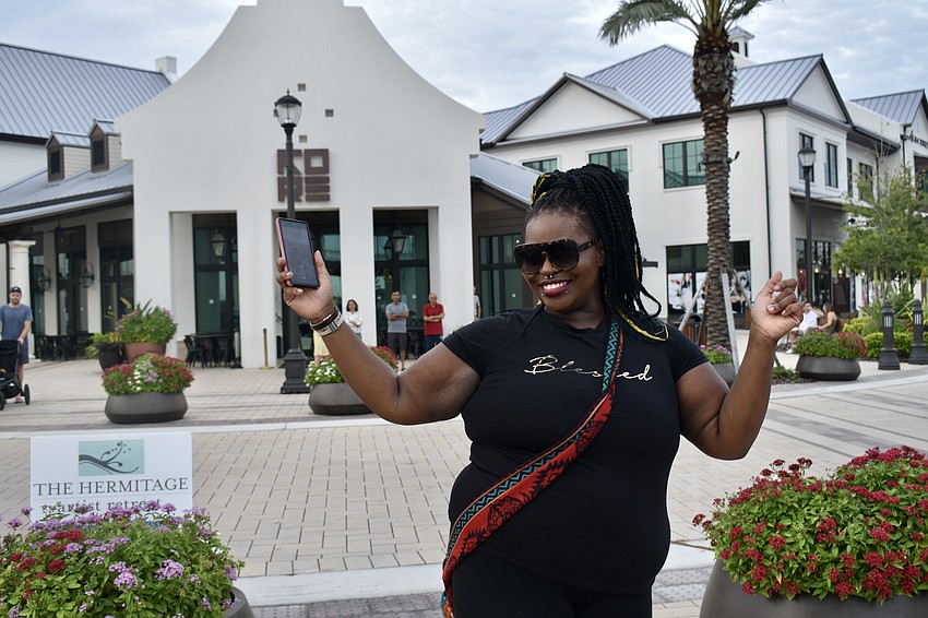 Bradenton resident and massage therapist Eboni Lavender dances in the back to support her friends in the cast.