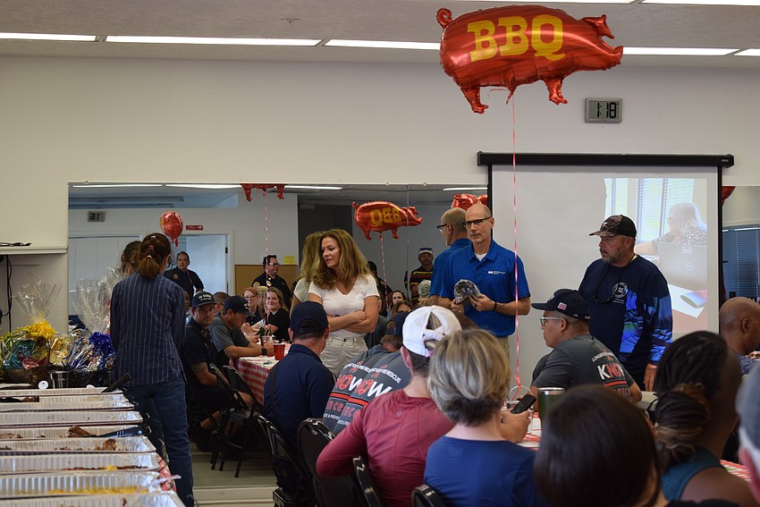 Town employees try to recite the town of Longboat Key’s vision from memory to win a prize.