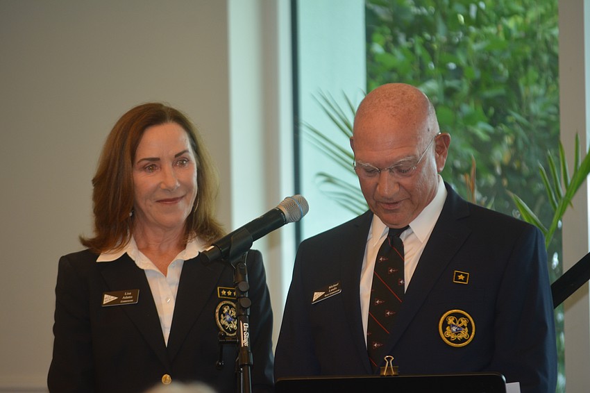 Outgoing Commodore Lisa Adams and incoming Vice Commodore Michael Landis during the Change of Watch Ceremony.