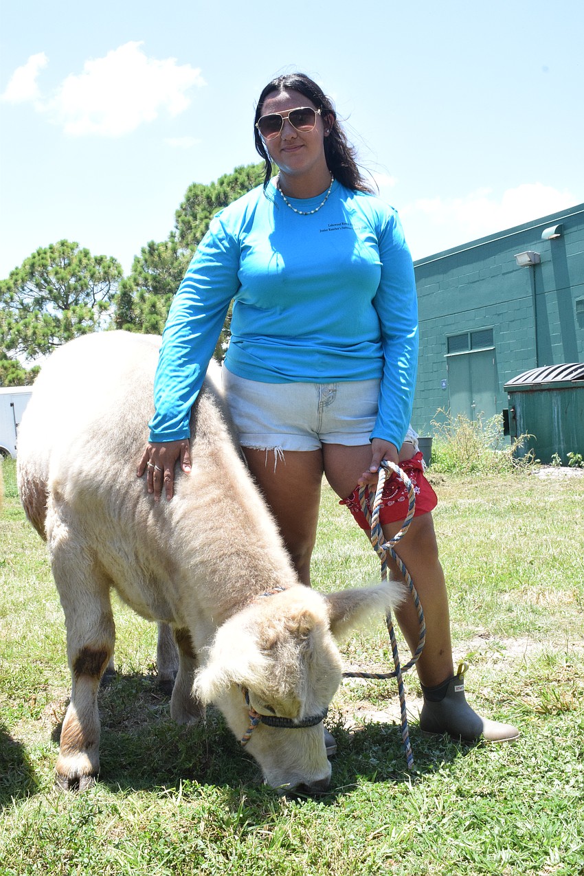Kendall Huerta, a rising junior, takes care of Yeti.