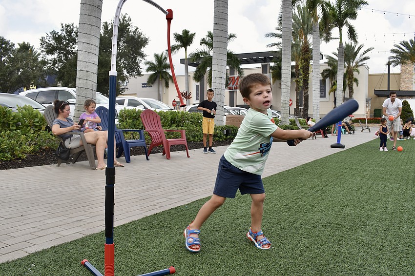 It's Lakewood Ranch resident Prescott Delk's first time at the playdate, but not his first time at bat. He hit the ball across the green.