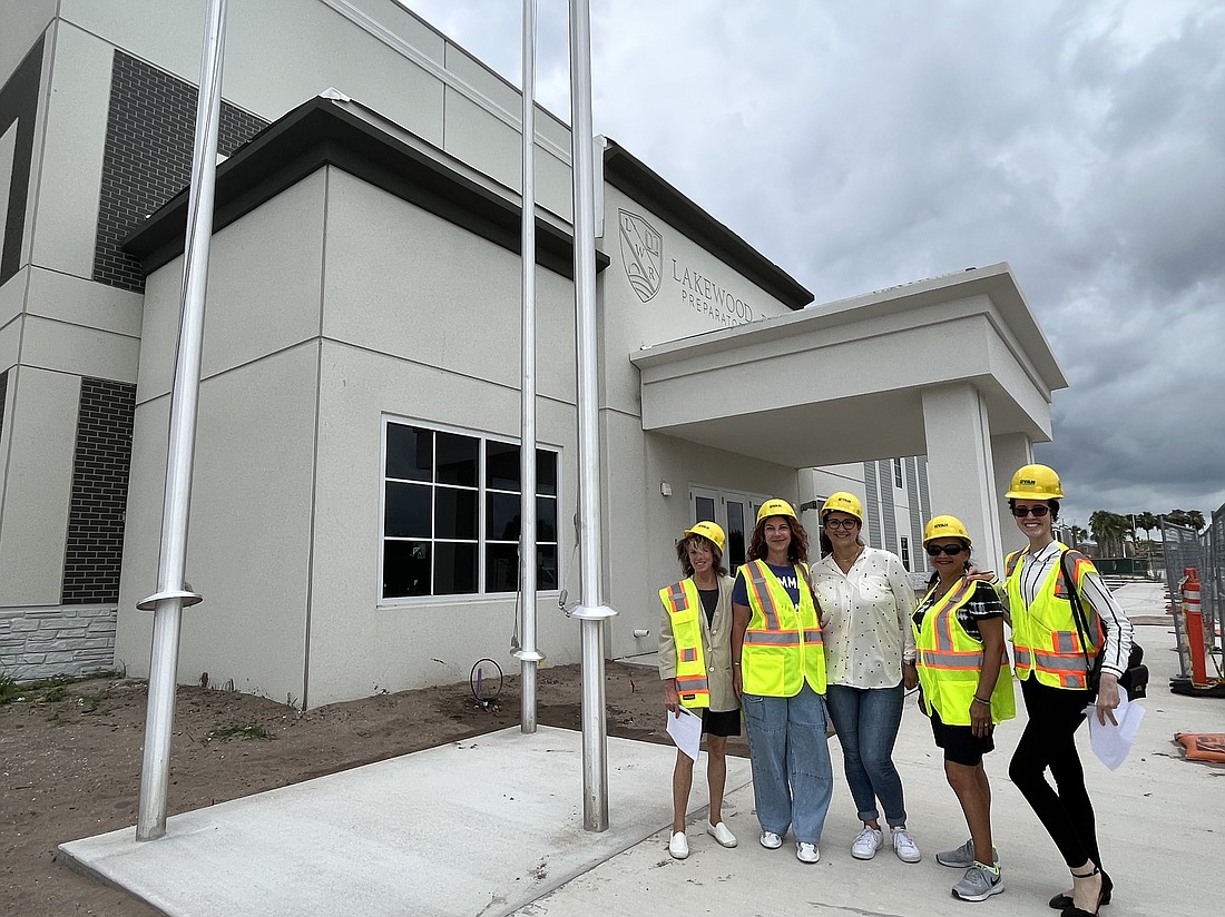 Lakewood Ranch Preparatory Academy staff members and school partners tour the new upper school.