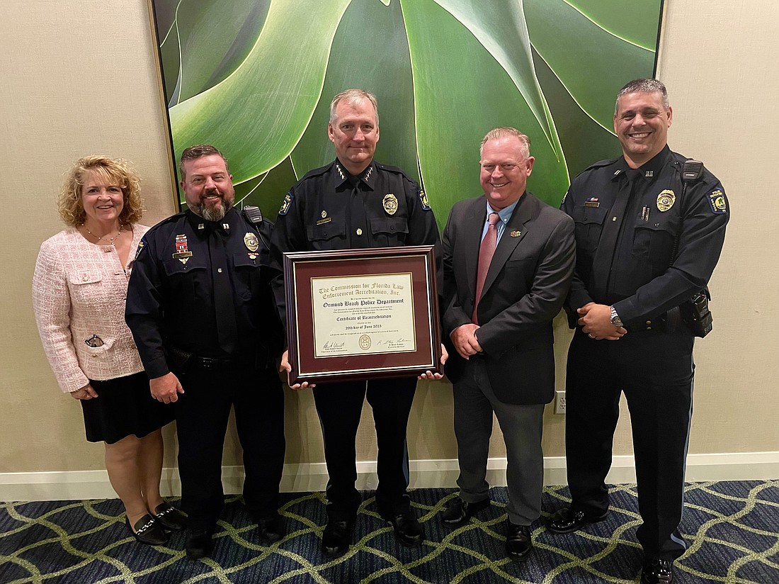 Ormond Beach City Manager Joyce Shanahan, Ormond Beach Police Capt. DW Smith, Chief Jesse Godfrey, Accreditation Manager Jeff Owens and Ormond Beach Police Capt. Chris Roos. Photo courtesy of the city of Ormond Beach