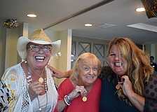 Sherry King, Shirley Martin and Melissa Martin showing off their Martin women medallions.