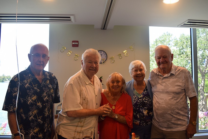 Buck and Shirley Martin with their wedding party 70 years later.