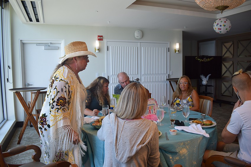 Martin family eating and chatting.