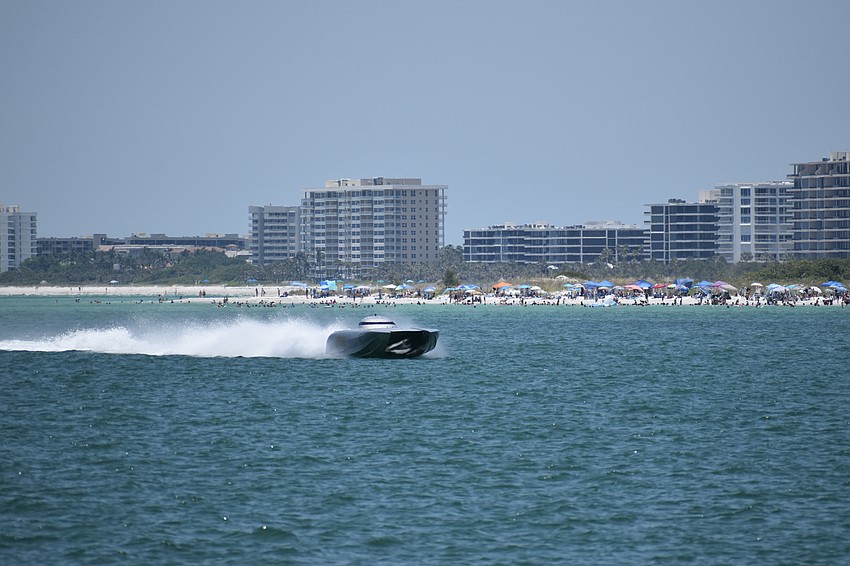 The.dfYOUNG boat piloted by Hugh Fuller of Delray Beach, Florida and Rich Wyatt of Pennsylvania appears.
