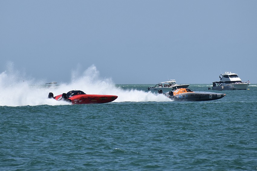 The Waves and Wheels / Doug Wright piloted by Logan Adan of Melbourne, Florida and Ricky Maldonado of Palmetto, Florida is on the tail of tthe Gladiator Canados boat piloted by Ervin Grant of Massachusetts and Michel Karsenti of Miami Beach, Florida.