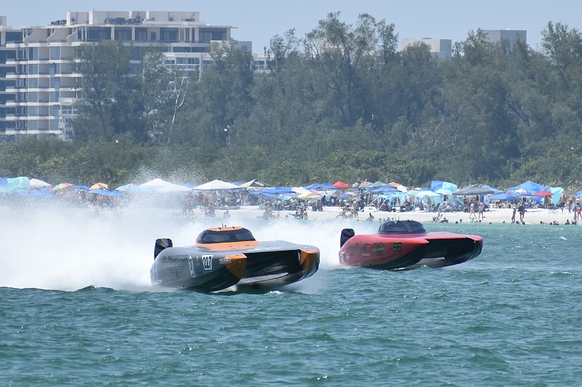 The Gladiator Canados boat piloted by Ervin Grant of Massachusetts and Michel Karsenti of Miami Beach, Florida races against the the Waves and Wheels / Doug Wright boat piloted by Logan Adan of Melbourne, Florida and Ricky Maldonado of Palmetto, Florida.