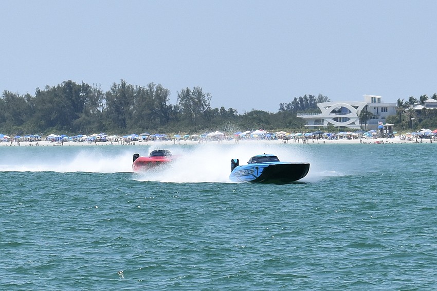 The Waves and Wheels / Doug Wright boat piloted by Logan Adan of Melbourne, Florida and Ricky Maldonado of Palmetto, Florida narrowly avoids a collission with the T/S Motorsports / Marine Technology boat piloted by Taylor Scism of Missouri and Johnny Tomlinson of North Miami, Florida.