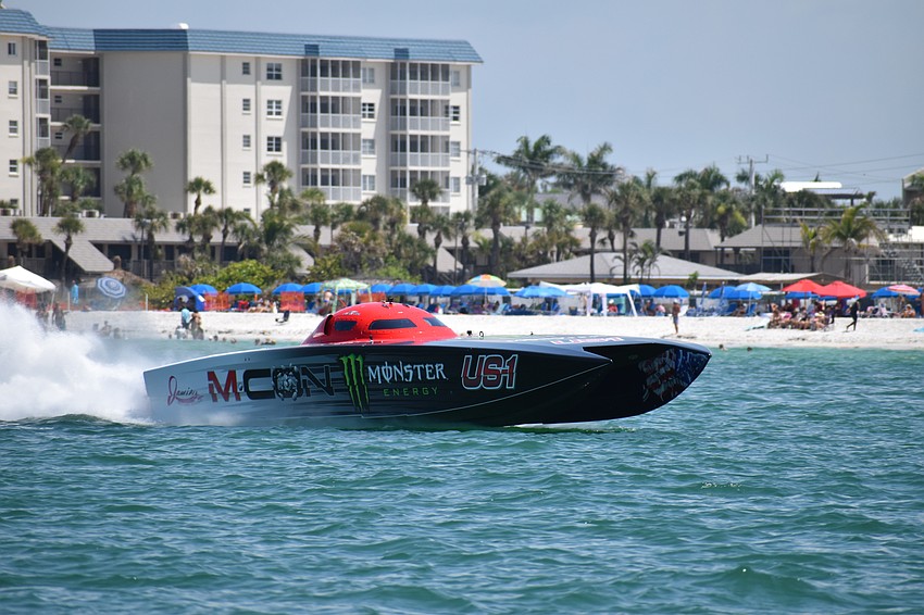The Monster Energy / M CON.boat piloted by Myrick Coil of Missouri and Tyler Miller of Kansas races by Lido Beach.