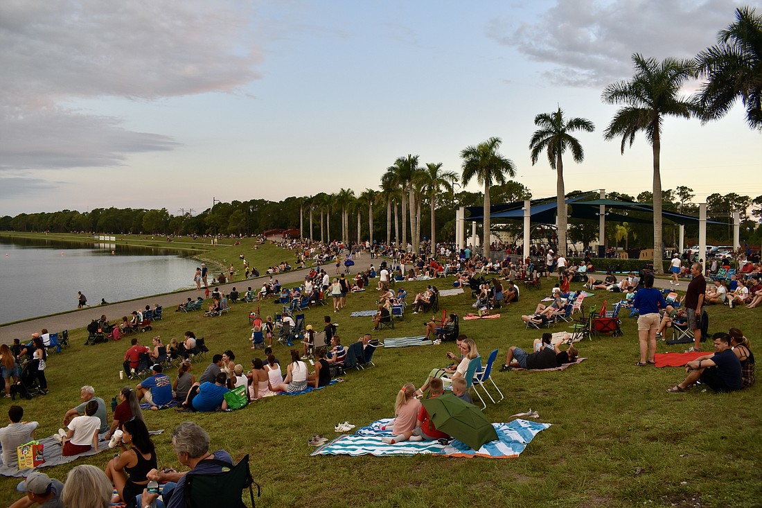 Spectators are set up on all sides of the lake to watch the fireworks show at Nathan Benderson Park.