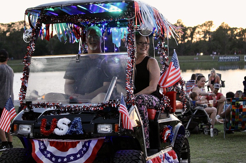 Sarasota residents Russell Seward and Nicole Sears deck their golf cart out for every holiday.