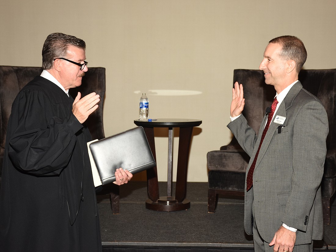 Fourth Judicial Circuit Chief Judge Lance Day administered the oath of office to 2023-24 Jacksonville Bar Association President Blane McCarthy on June 15.