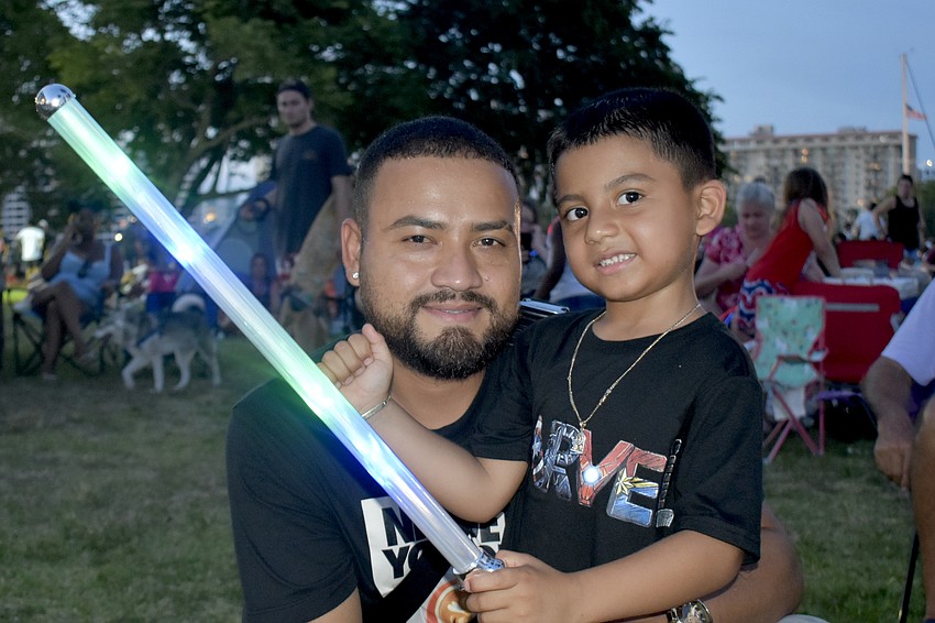 Pedro Castellon and 5-year-old Benjamin Castellon.