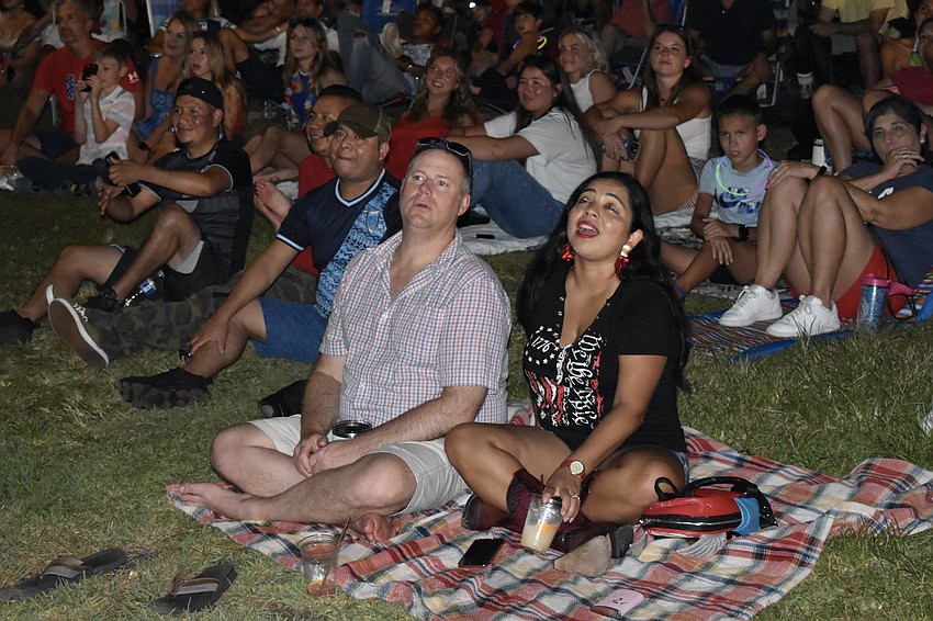 Chris Keys and Miloska Zavala watch the fireworks.