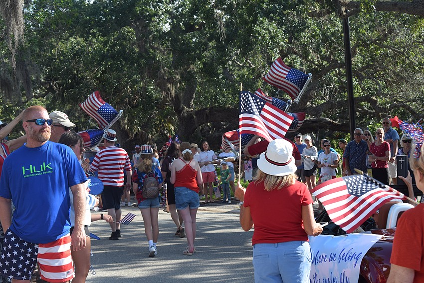 People watching Longboat Key's Freedom Fest parade.