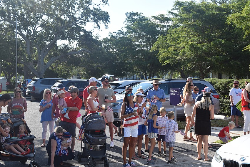 People watching Longboat Key's Freedom Fest parade.