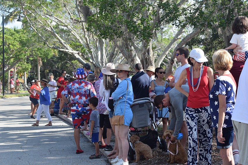 People watching Longboat Key's Freedom Fest parade.
