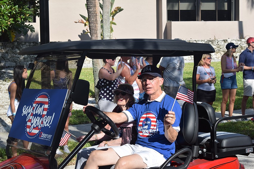 Matt and Lisa Walsh leading the Observer group in the parade.