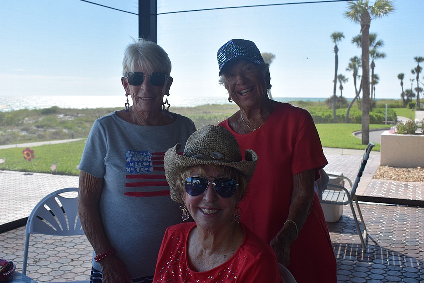 June Hessel, Sandy Endres, and Nancy Chanos call themselves the three musketeers of Seaplace Condo.