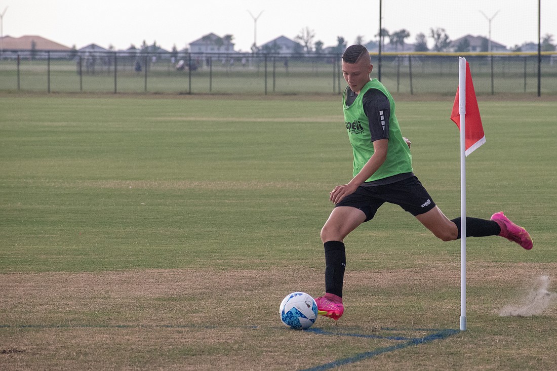 Brandin Gallaway takes a corner kick for Braden River Soccer Club during a practice at Premier Sports Campus in July 2023. Elliott Falcione said youth soccer will continue to be a cornerstone of the facility's schedule in the coming years.