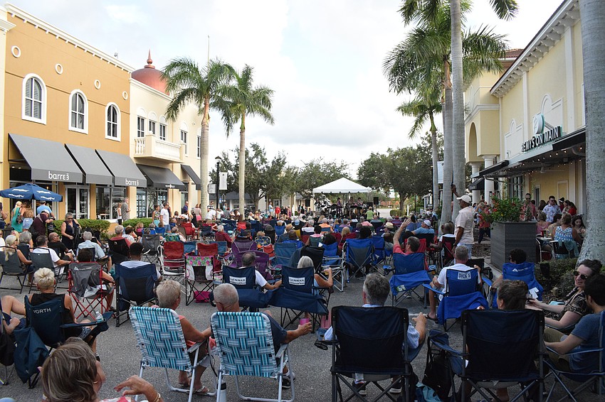 The heat doesn't keep people from enjoying a Friday night on Main Street at Lakewood Ranch during Music on Main.
