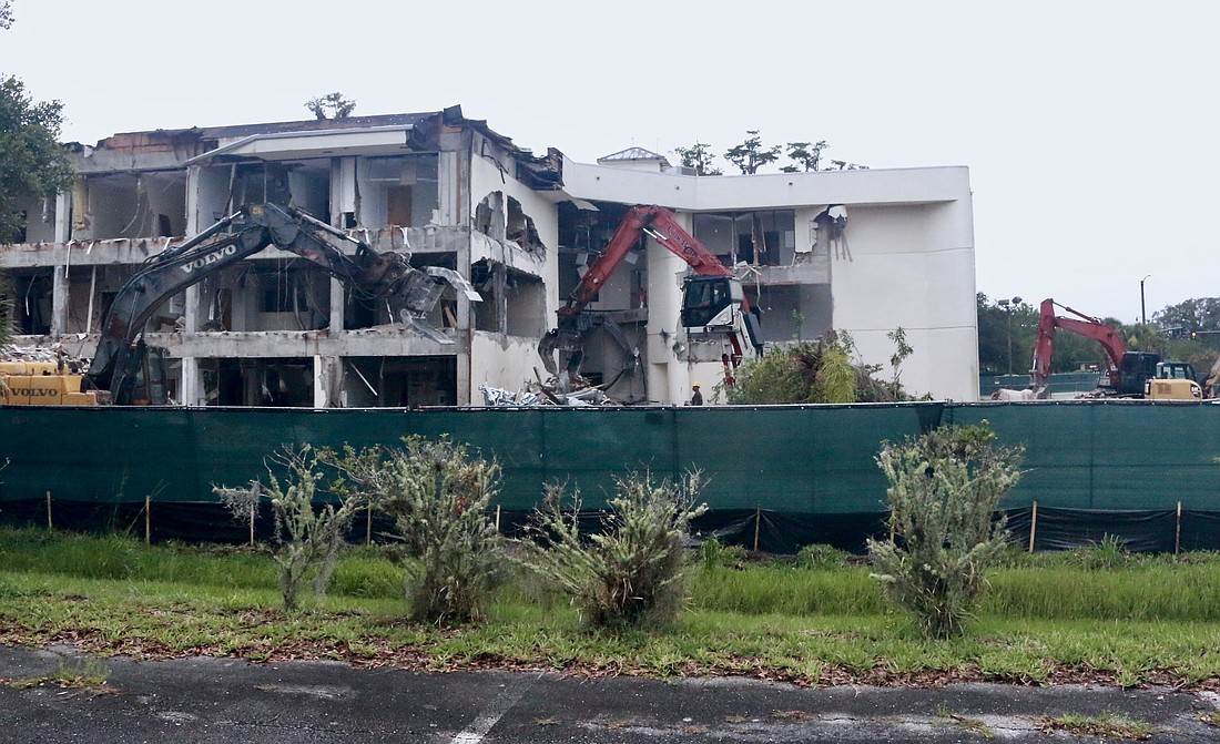 Demolition of the Paul Katz building on Palm Coast Parkway began Monday, July 10. Photo by Sierra Williams