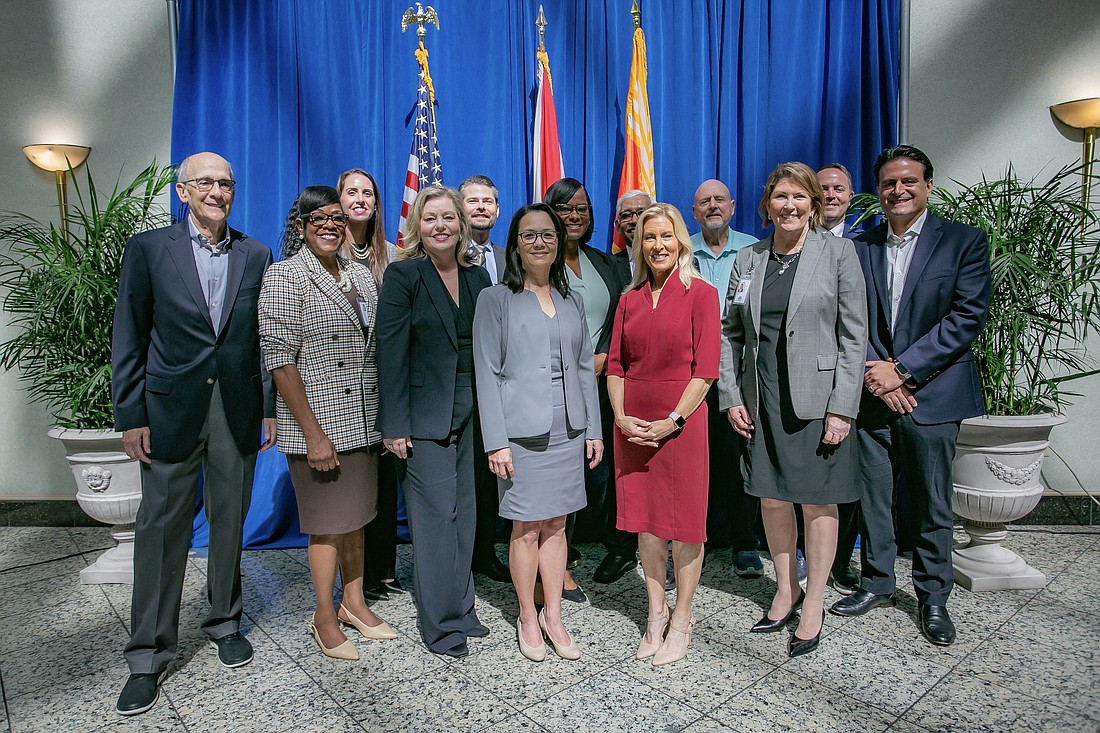 Key members of Mayor-elect Donna Deegan’s staff. From left, Bob Rhodes, Pat McCollough, Erica Connor, Melissa Ross, Philip Perry, Anna Brosche, Lakesha Burton, Deegan, Parvez Ahmed, Mike Weinstein, Karen Bowling, Ed Randolph and Jason Gabriel. Weinstein is interim CFO and Gabriel is chair of the Qualification Review Committee to interview new general counsel candidates.