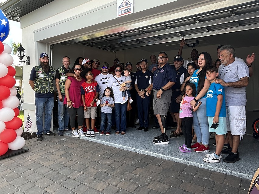 The Gaytan family (center) is supported by dozens of veterans.