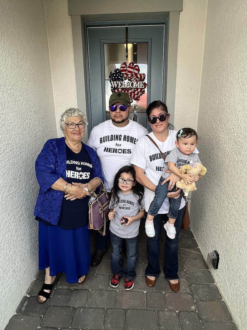 Concepcion Gaytan, Army Sgt. Lucio Gaytan, 6-year-old Lucious Gaytan, Ivette Gaytan and 1-year-old Lyanna Gaytan are welcomed to their new home.
