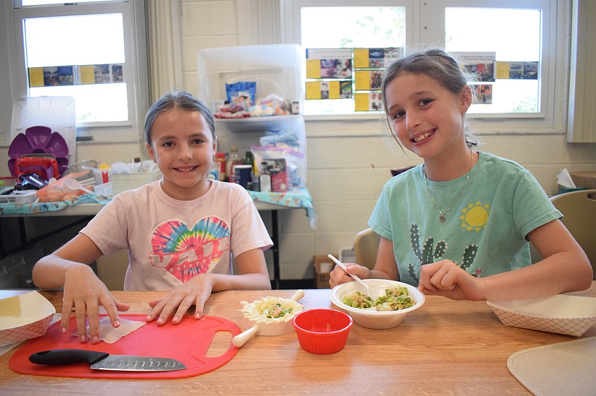 Kaitlyn Olivo, a rising fifth grader, and Georgia Kennedy, a rising third grader, love learning how to make food from scratch. 