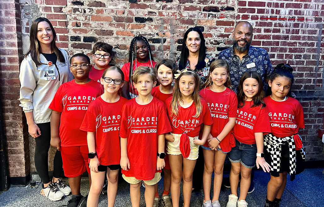 Lauren Nadeau, community relations specialist; Lauren Cardona, allied health and support services administrator at Horizon West Hospital; and Keith Davenport, chief operating officer at the Garden Theatre, met some of the participants in the Garden Theatre summer camp.