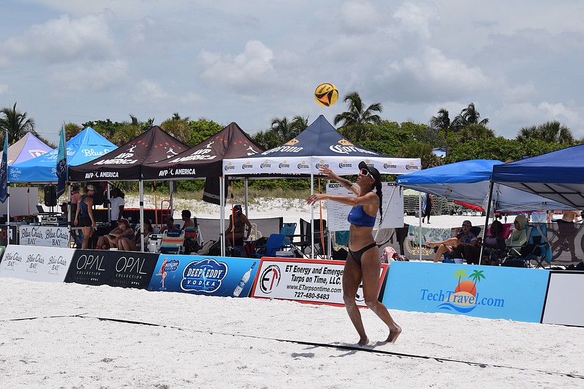A player serving at the July Independence Volleyball Tournament on Lido Key Beach.
