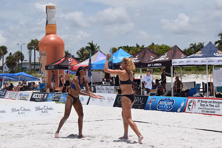 Players excited they made it to the next round of the July Independence Volleyball Tournament on Lido Key Beach.