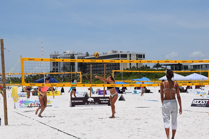 A Men's Open division team in the July Independence Volleyball Tournament on Lido Key Beach