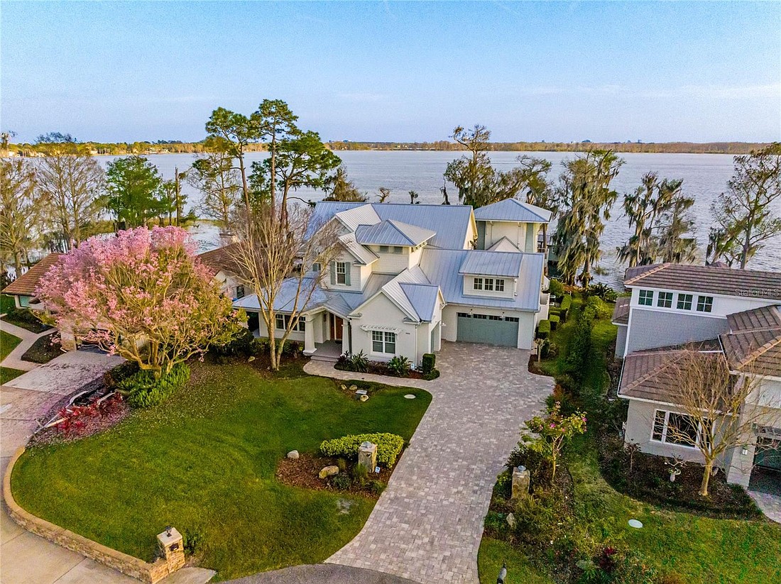 The home at 9908 Lone Tree Lane, Orlando, sold July 14, for $3.7 million. “Seaglass” is a custom-built lakefront estate with double water views on the Butler Chain of Lakes. The selling agent was Kim Arena, Coldwell Banker Realty.